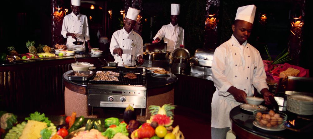 Chefs preparing the BBQ station at Serena Serengeti Safari Lodge, Serengeti National Park, Tanzania - Image 6