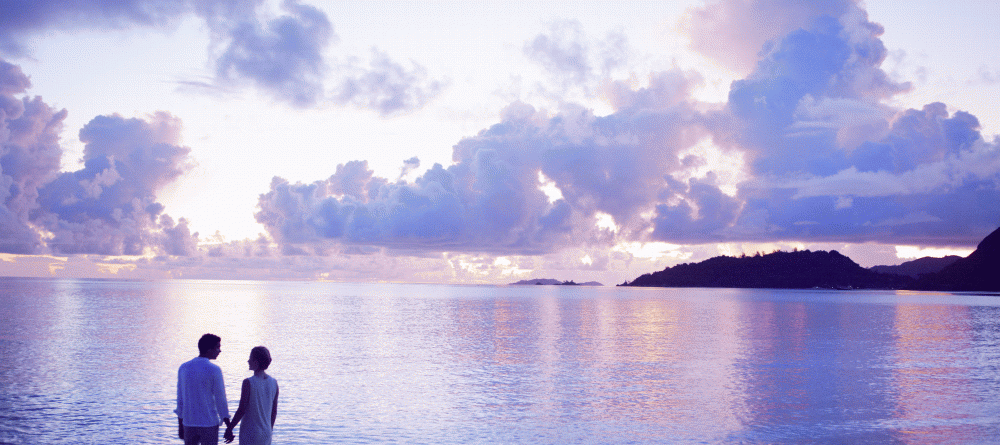 Romantic sunset walk on the beach at Raffles Praslin, Praslin, Seychelles - Image 11