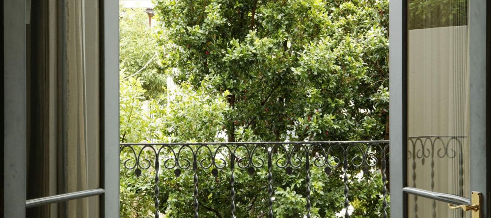 The view out of a guestroom onto the courtyard at Welgelegen Boutique Hotel, Cape Town, South Africa - Image 14