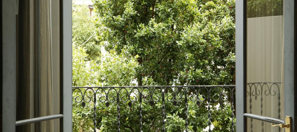 The view out of a guestroom onto the courtyard at Welgelegen Boutique Hotel, Cape Town, South Africa - Image 1