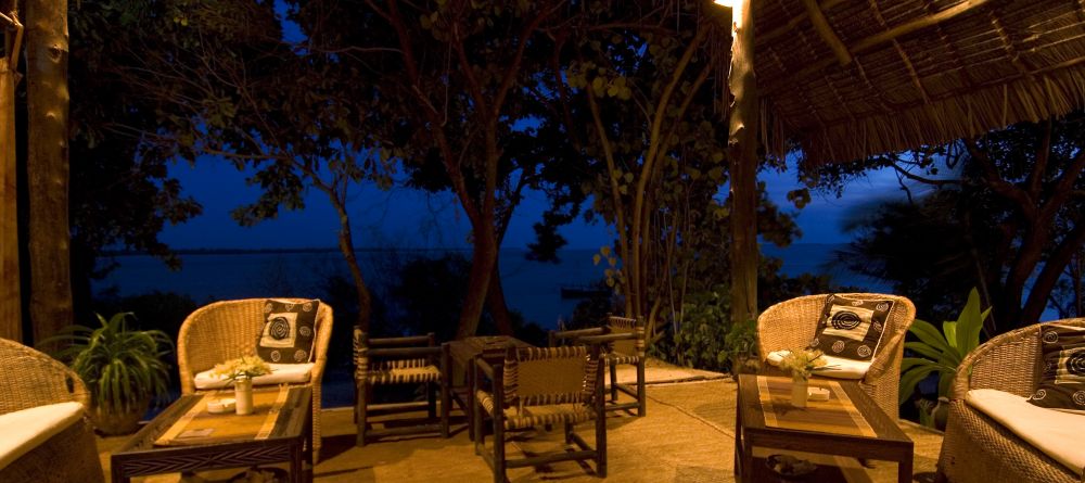 The bar where guests can relax with a cocktail at Pole Pole Bungalow Resort, Mafia Island, Tanzania - Image 12