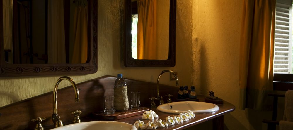 The guest bathrooms at Pole Pole Bungalow Resort, Mafia Island, Tanzania - Image 11