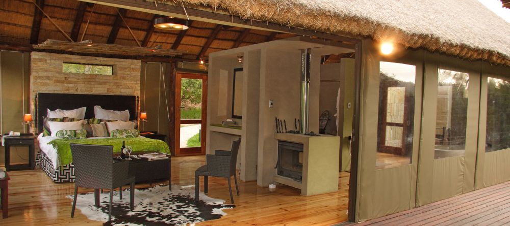 The bedroom opens up onto a private balcony at Shamwari Bayethe Tented Lodge, Shamwari Game Reserve, South Africa - Image 16