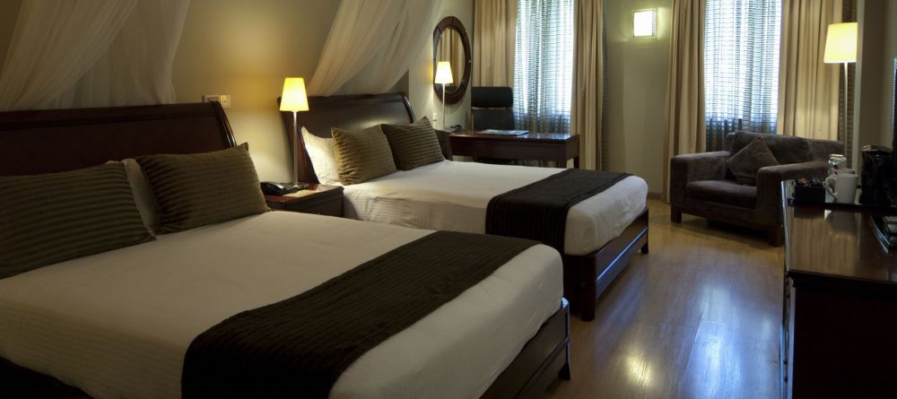 Guest room at Arusha Hotel - Image 1