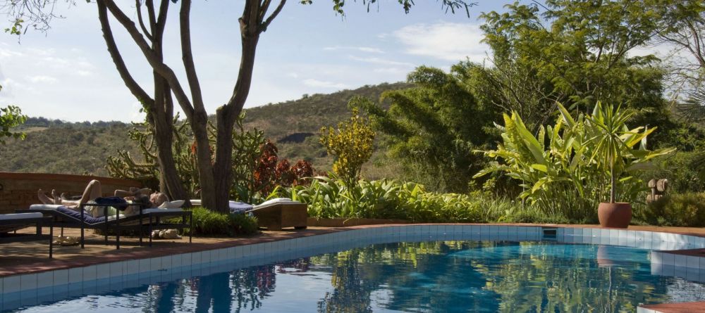 Relaxing by the pool at the Plantation Lodge, Karatu, Tanzania - Image 10