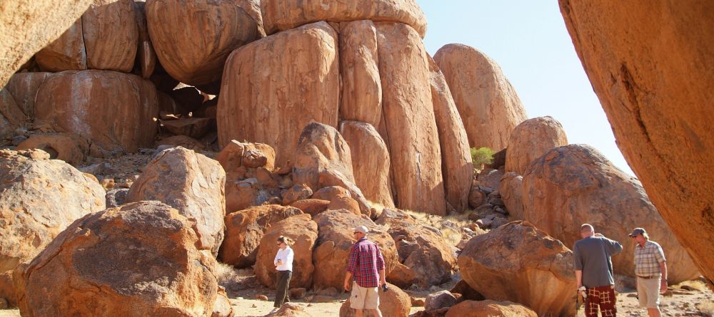 Hiking through the dramatic boulders at Wolwedans Dune Camp, NamibRand Nature Reserve, Namibia - Image 3
