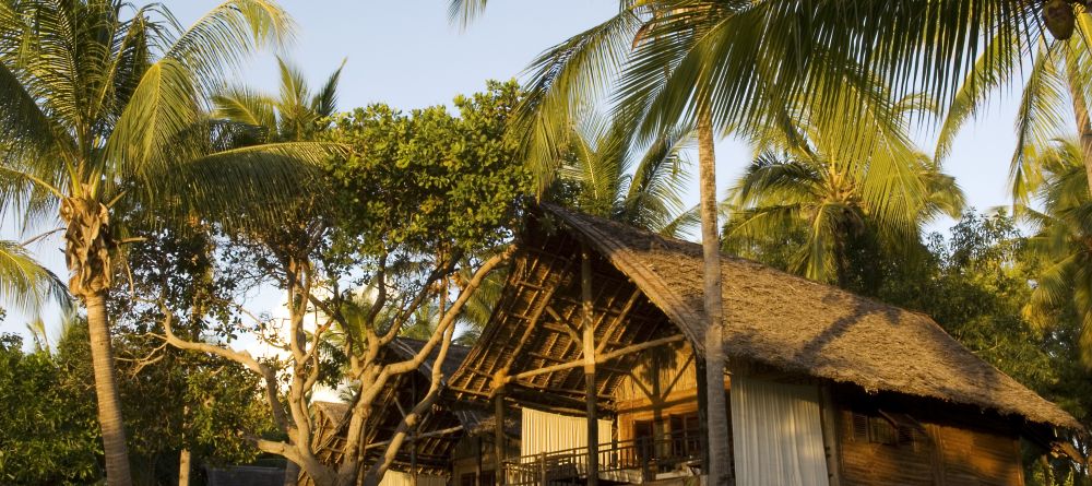 The bungalows sit amid the swaying palms at Pole Pole Bungalow Resort, Mafia Island, Tanzania - Image 1