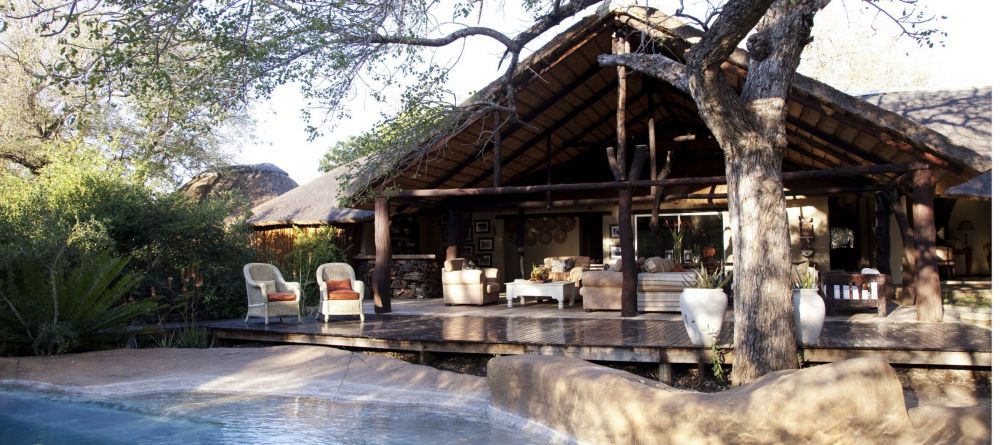 Pool and day lounge at Chapungu Luxury Tented Camp, Thornybush Game Reserve, South Africa - Image 4