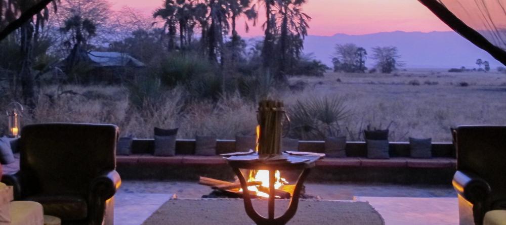 Take in the sounds of Africa at sunset while lounging by the campfire at Chem Chem Lodge, Lake Manyara National Park, Tanzania - Image 19