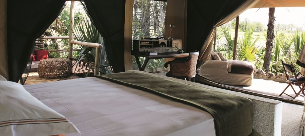 A double tent with elegant African-inspired decor at Chem Chem Lodge, Lake Manyara National Park, Tanzania - Image 11