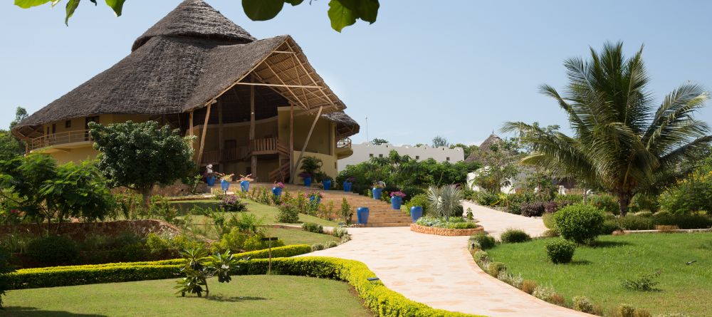 Manicured lawns and lush tropical gardens intermingle at Gold Zanzibar Beach House & Spa, Zanzibar, Tanzania  - Image 13