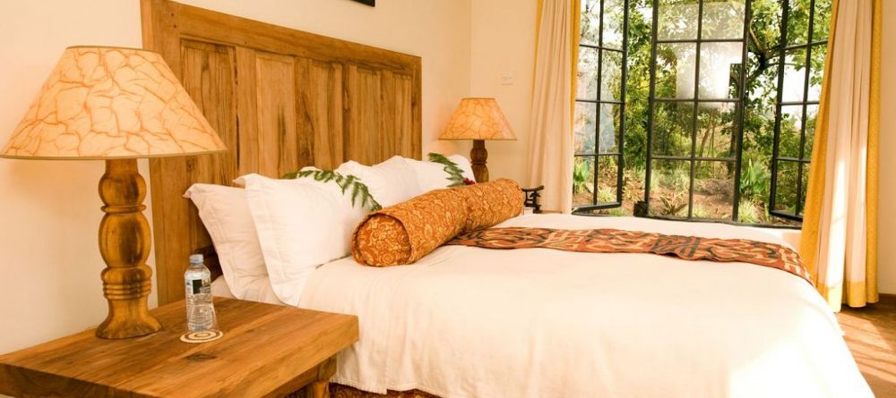 Guest room at Clouds Mountain Gorilla Lodge - Image 8