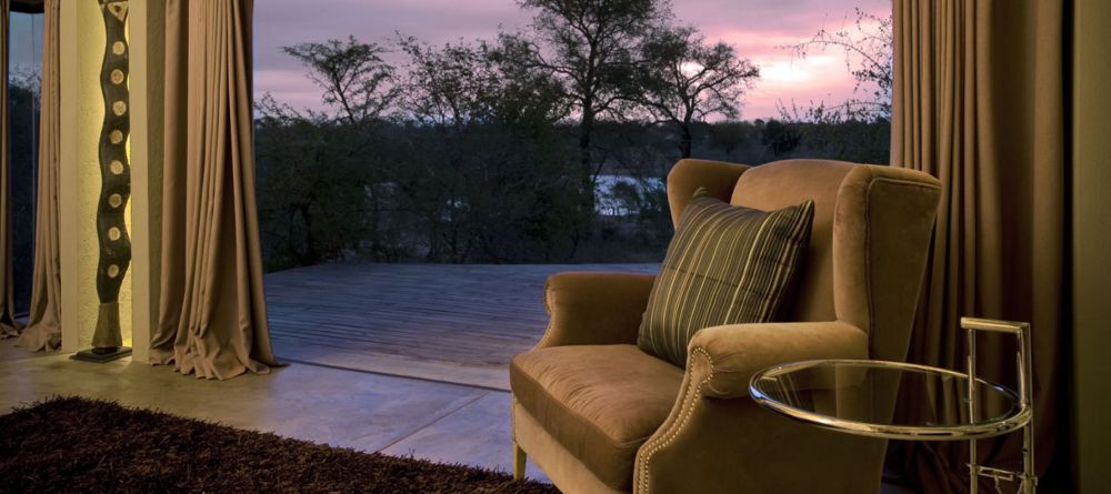 Recline in comfortable chair and admire the sunset at Chitwa House, Sabi Sands Game Reserve, South Africa - Image 7