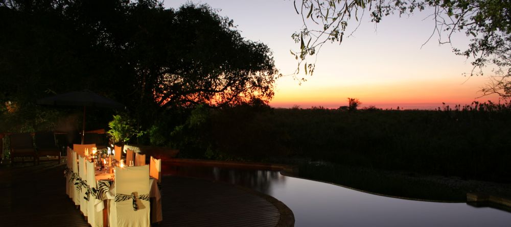 Dining at sunset at Impalila Island Lodge, Caprivi Strip, Namibia - Image 6