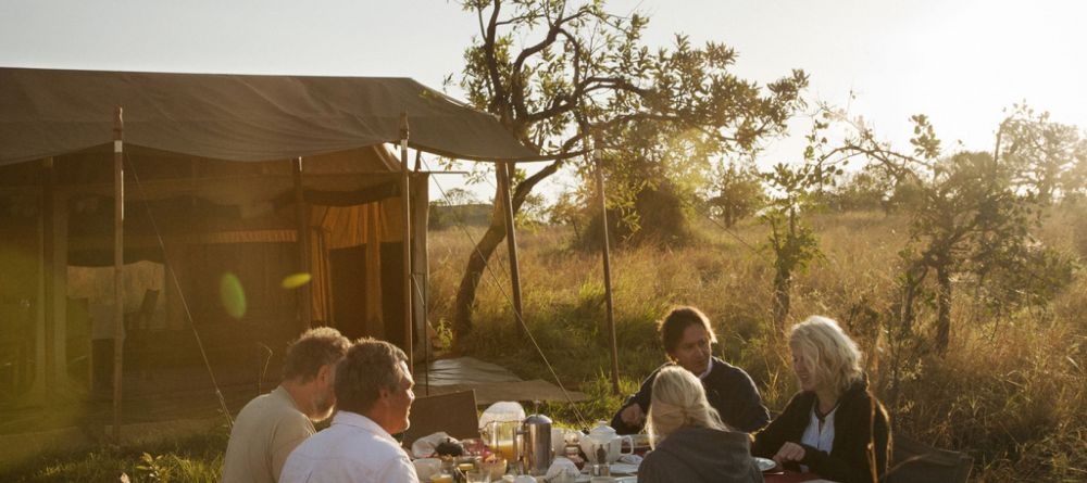 Dining al fresco at Serengeti Safari Camp - Central, Serengeti National Park, Tanzania - Image 1