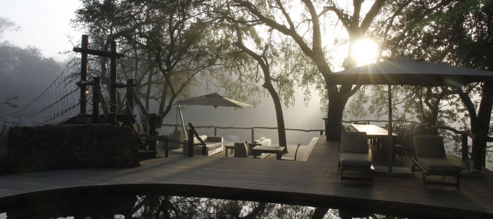 The pool deck in the early morning mist at Dulini Lodge, Sabi Sands Game Reserve, South Africa - Image 5