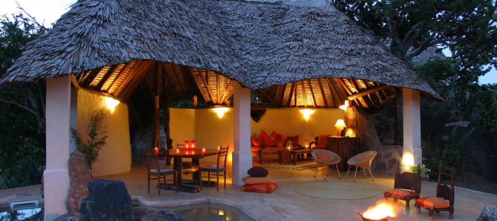 The private indoor-outdoor lounge area at the Eagle Cottage at Sabuk Lodge, Laikipia, Kenya - Image 4