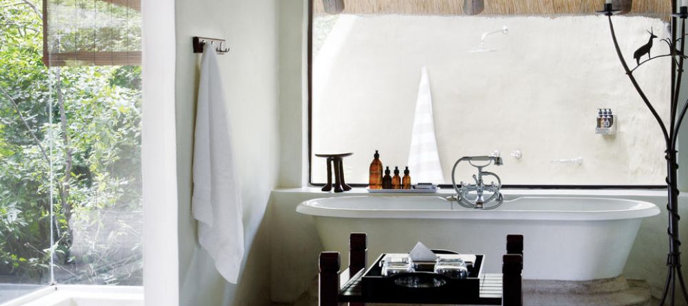 The modern and chic bathroom at Londolozi Varty Camp, Sabi Sands Game Reserve, South Africa - Image 3