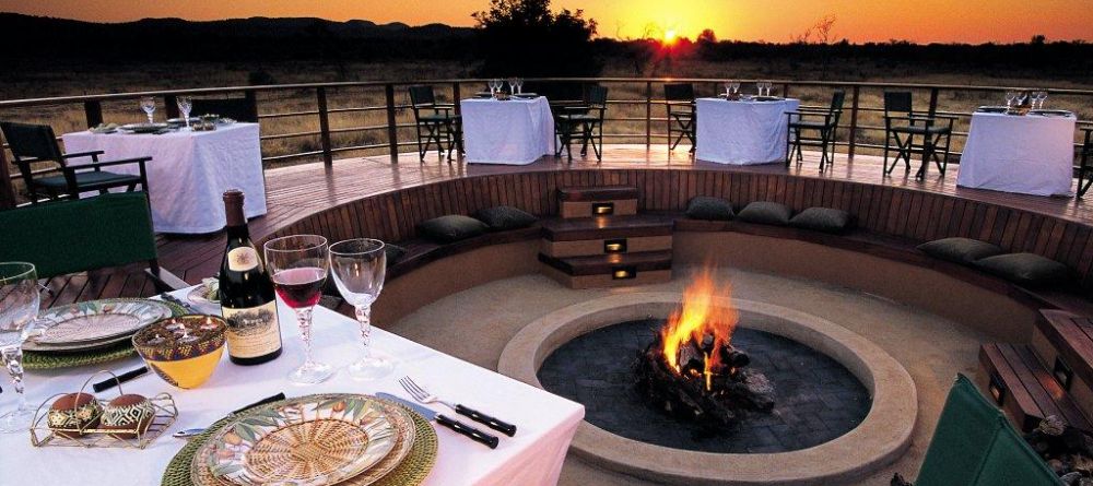 Outdoor dining around the fire at Mateya Safari Lodge, Madikwe Game Reserve, South Africa - Image 14