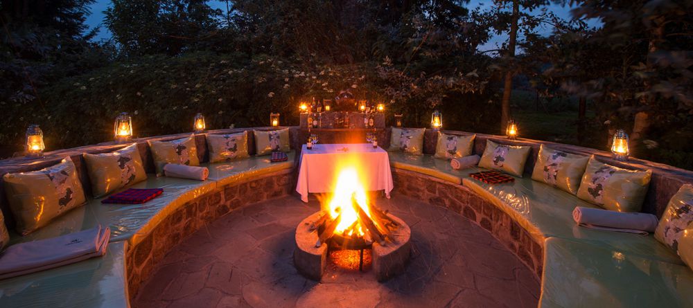 Fire pit at night at Amakoro Songa Lodge - Image 5