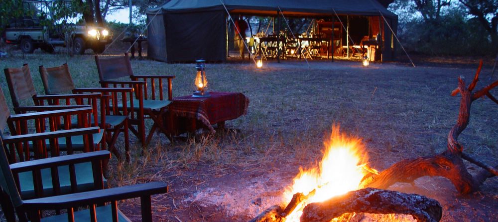 Fireside relaxation at Chada Katavi Camp, Katavi National Park, Tanzania Â© Nomad Tanzania - Image 19