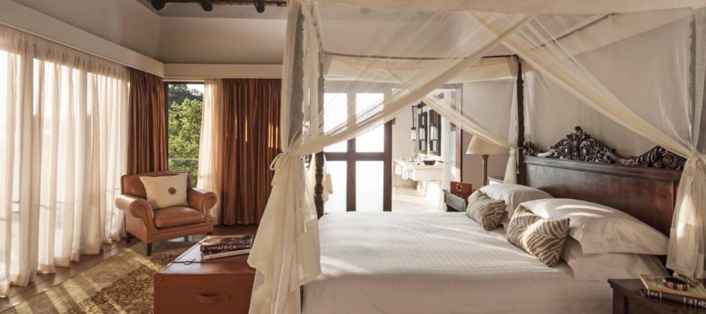 The luxuriously comfortable bedrooms at The Four Seasons Safari Lodge, Serengeti National Park, Tanzania - Image 6
