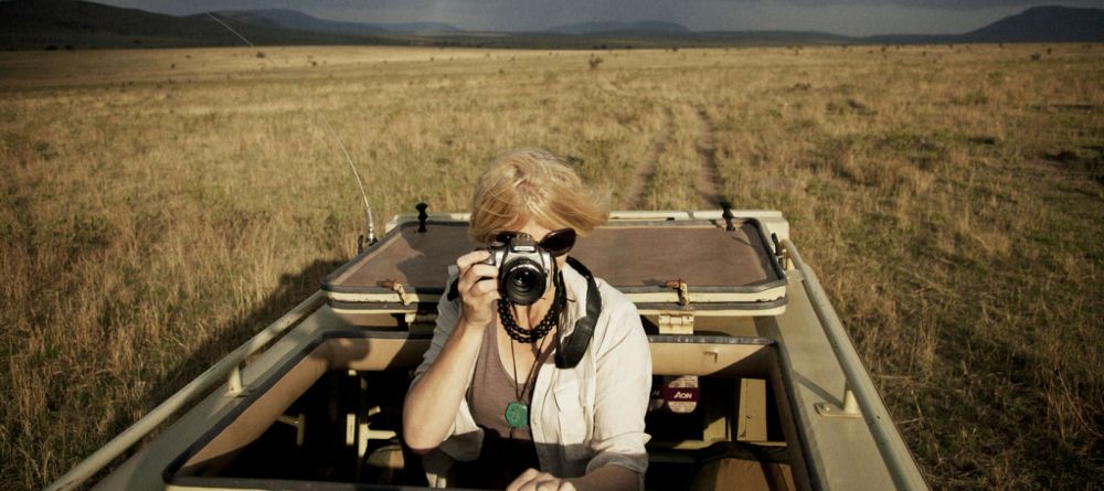 Photography during a game drive at Serengeti Safari Camp - Central, Serengeti National Park, Tanzania - Image 9