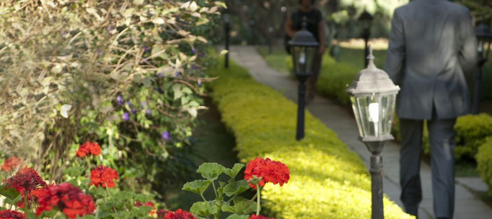 Manicured gardens at The Arusha Hotel, Arusha, Tanzania - Image 6