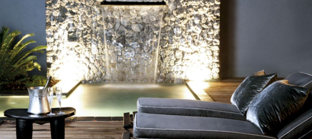 The velvet sun loungers beside a luxurious private plunge pool at Londolozi Granite Suites, Sabi Sands Game Reserve, South Africa - Image 1