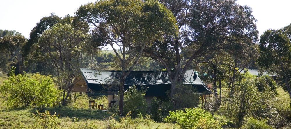 A guest tent in its beautiful setting at Offbeat Mara Camp, Masai Mara National Reserve, Kenya - Image 5