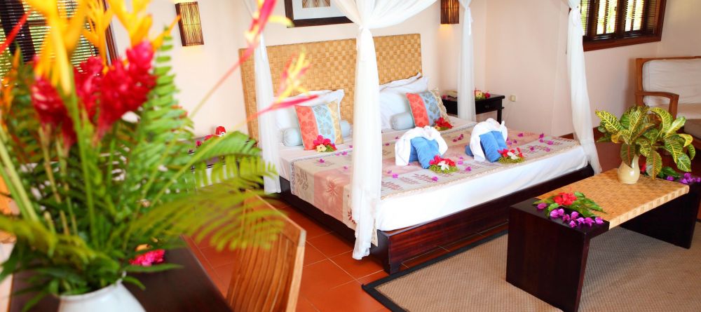 A colorful guest room at Hotel L Archipel, Praslin, Seychelles - Image 5
