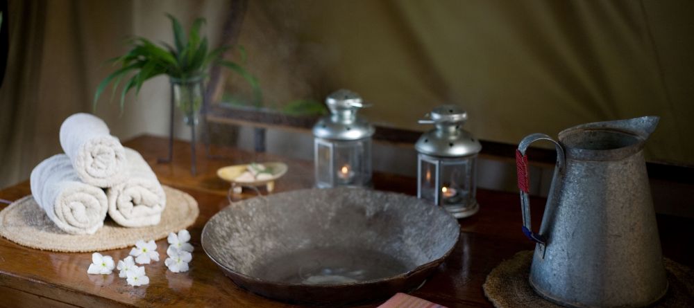 A pitcher and basin for washing up at Offbeat Mara Camp, Masai Mara National Reserve, Kenya - Image 2