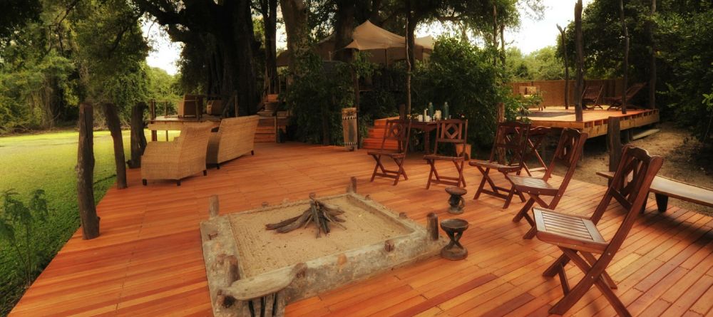 Relaxation on the deck at Kanga Camp, Mana Pools National Park, Zimbabwe - Image 1