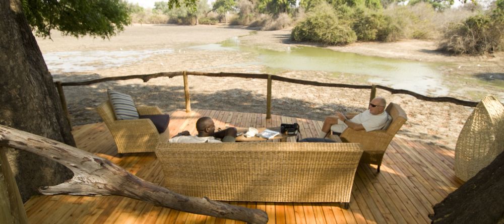 Relaxation on the deck at Kanga Camp, Mana Pools National Park, Zimbabwe - Image 12