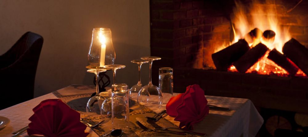 Romantic fireside dining at Kitela Lodge and African Spa, Karatu, Tanzania - Image 5