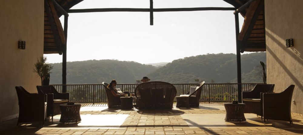 Sit on the veranda overlooking the valley at Kitela Lodge and African Spa, Karatu, Tanzania - Image 6