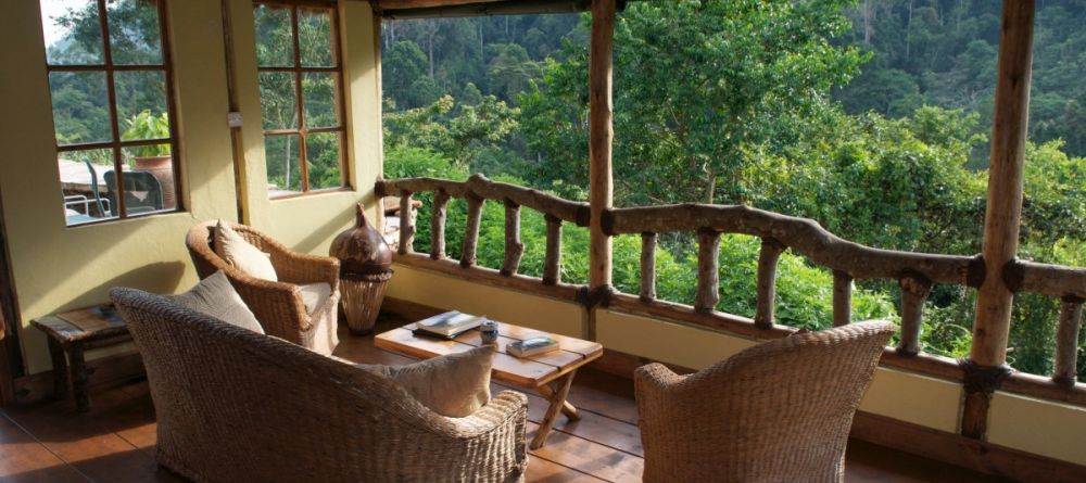 Lounge with view at Volcanoes Bwindi Lodge, Bwindi Impenetrable Forest, Uganda - Image 8