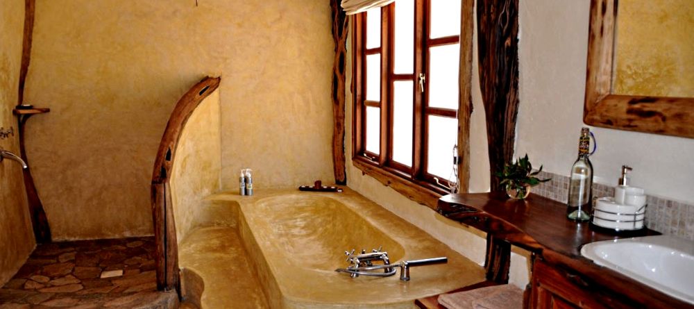 A charming and rustic bathroom at Mara House, Masai Mara National Reserve, Kenya - Image 15