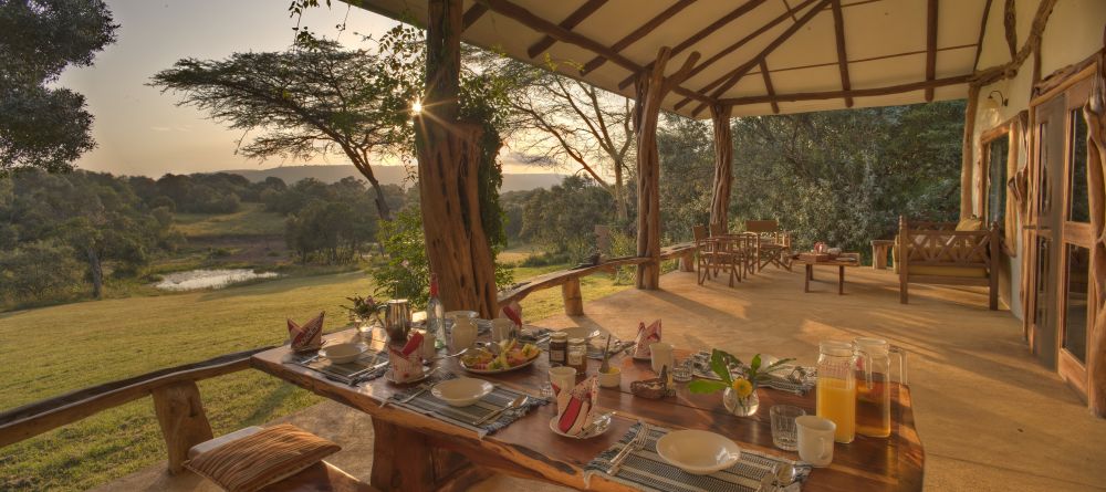 Watch the sunset over the water hole from the spacious front veranda at Mara House, Masai Mara National Reserve, Kenya (photo by Stevie Mann) - Image 1