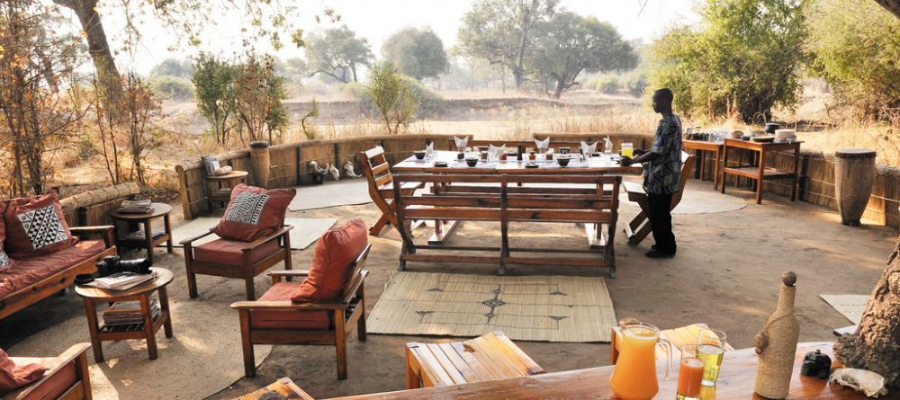 Outdoor dining and lounge deck at Mwamba Bush Camp, South Luangwa National Park, Zambia - Image 14