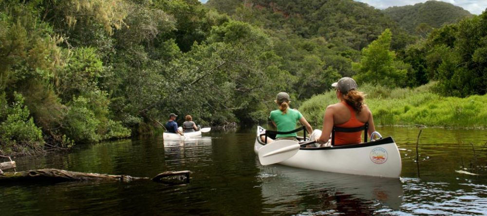Canoeing nearby through the spectacular natural setting at Pezula Resort and Spa, Knysna, South Africa - Image 1