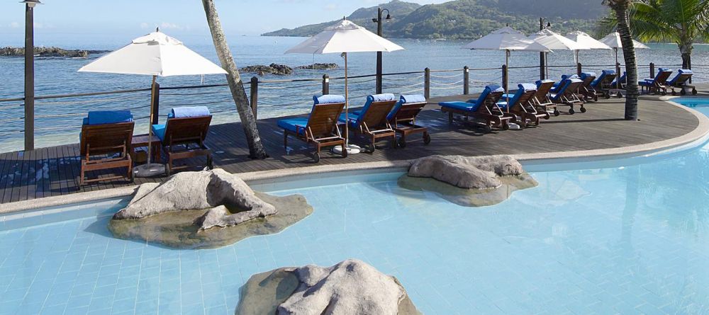 Sun loungers and and ocean view from the pool at Le Meridien Fishermans Cove, Mahe, Seychelles - Image 2