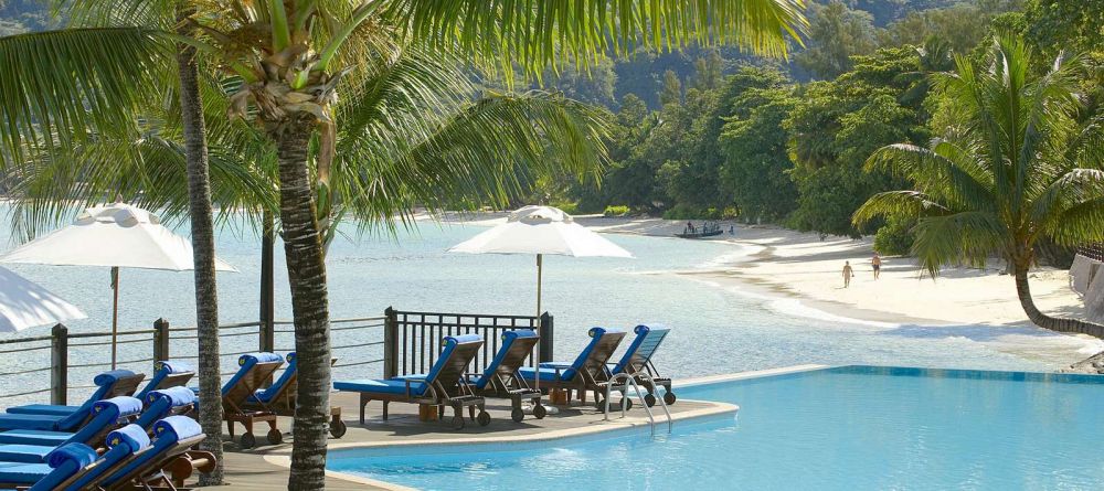 Pool with the nearby beach at Le Meridien Fishermans Cove, Mahe, Seychelles - Image 1