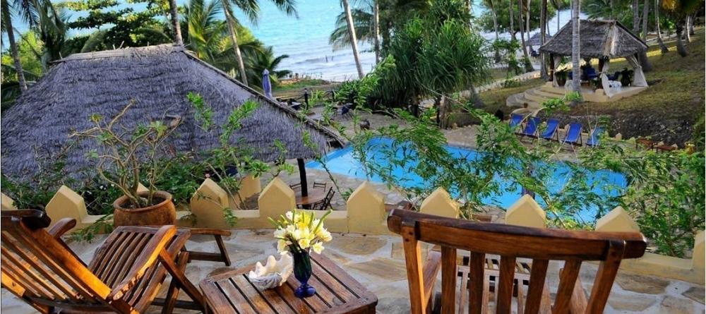 Take in the magnificent view of the ocean and swaying palm trees at Kinasi Lodge, Mafia Island, Tanzania - Image 6