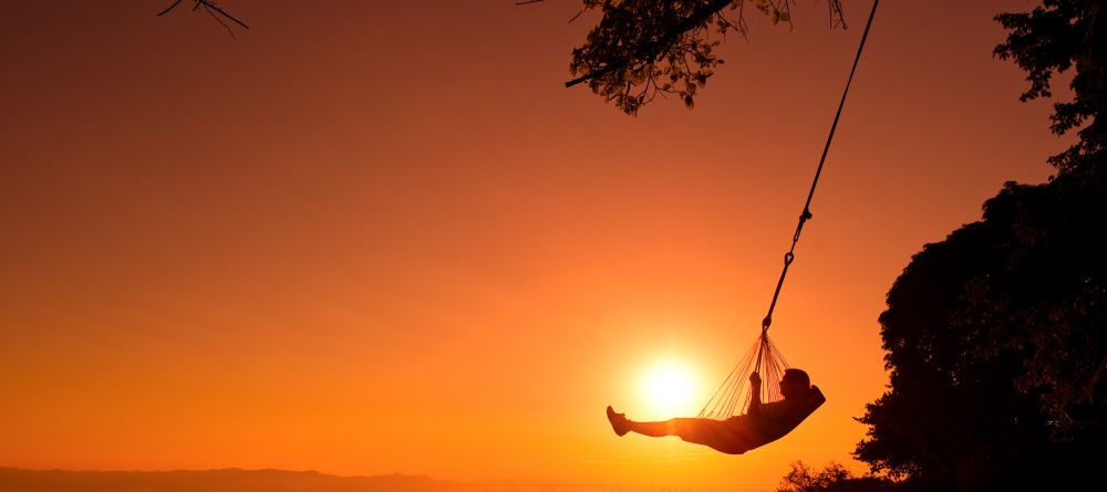 A moment of solitude and peace at sunset at Pumulani, Lake Malawi, Malawi - Image 1