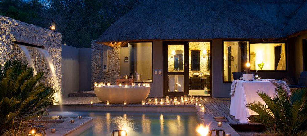 The peaceful private outdoor tub, plunge pool and veranda with dining at Londolozi Granite Suites, Sabi Sands Game Reserve, South Africa - Image 4