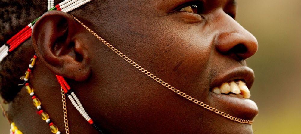 A close-up portrait of the elaborate bead-work jewelry worn by the tribesmen at Sabuk Lodge, Laikipia, Kenya - Image 12