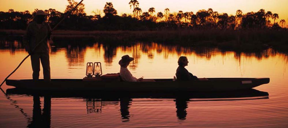 Boating at sunset at Sandibe Safari Lodge, Okavango Delta, Botswana - Image 11