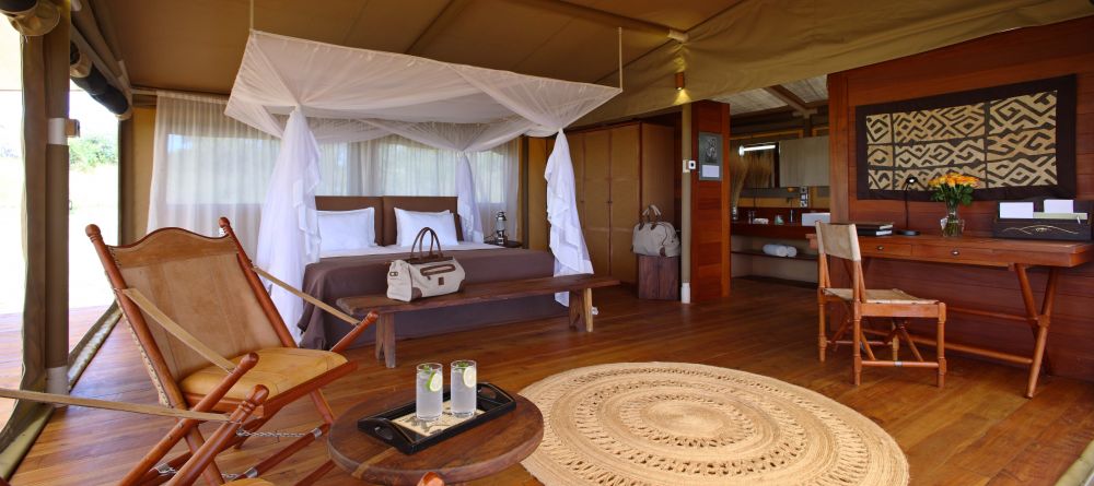 The luxurious bedroom with elements of African and Victorian-inspired decor at Serengeti Bushtops Camp, Serengeti National Park, Tanzania - Image 9