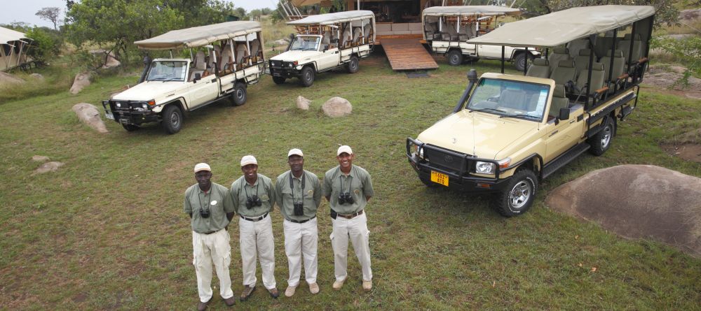 Safari guides await by their vehiclesr at Serengeti Bushtops Camp, Serengeti National Park, Tanzania - Image 10